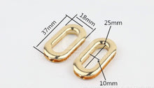 Load image into Gallery viewer, 1’ Oval Screw In Grommet $15.00/10 Sets
